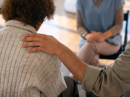 People sharing feelings and emotions during group therapy session